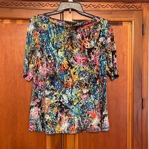 Good for work with black slacks or for fun pair pink shorts